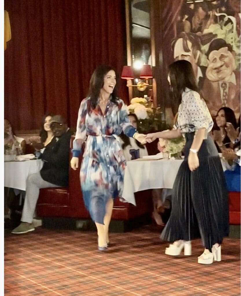 Houston Texans Foundation vice president Hannah McNair and designer Christy Lynn Lee at Drake's Hollywood luncheon. 